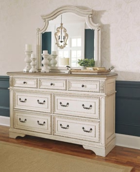 Cream colored wood dresser with mirror